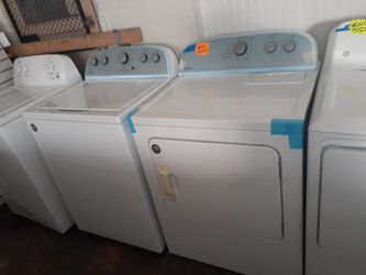 New scratch and dent Whirlpool top load washer and dryer set with,6 months warranty