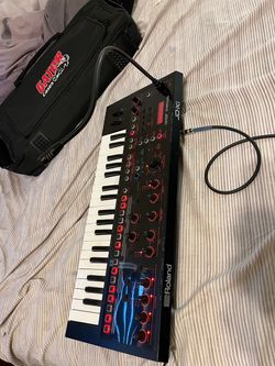 Roland jdxi with gator case and mic