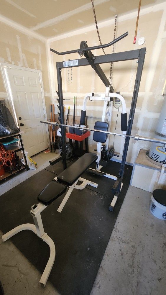 Weight Lifting Rack. Dumbbells, Bench, Weights, and Barbell