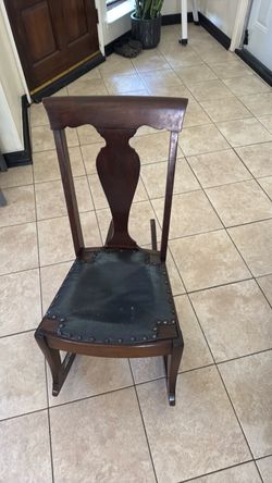 Dark brown kids antique rocking chair