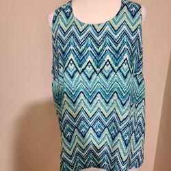 Exotic Pattern Sleeveless Top With White Chiffon Lining At Bottom And Blue Green Colors