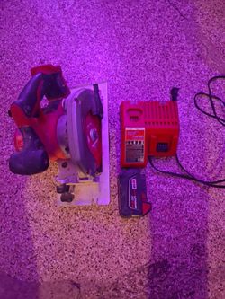 Milwaukee circular saw with battery and charger