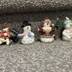 4 Christmas Ornaments Approx 3 1/2” Tall. One of them is a 2000 Coca -Cola Ornament. 