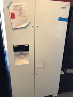 New scratch and dent whirlpool side by side fridge. 1 year warranty