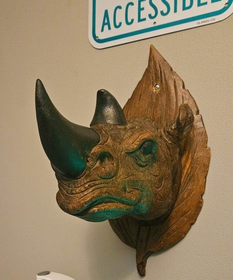 Wooden Rhino With Black Leather Hornes