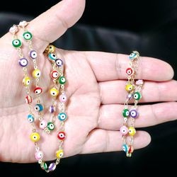Multicolor eye set Necklace, earrings and bracelets 14k gold plated.  Medalla,pulsera y aretes de ojito multicolor laminado en 14k.  