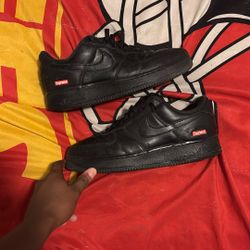 black supreme air force 1s