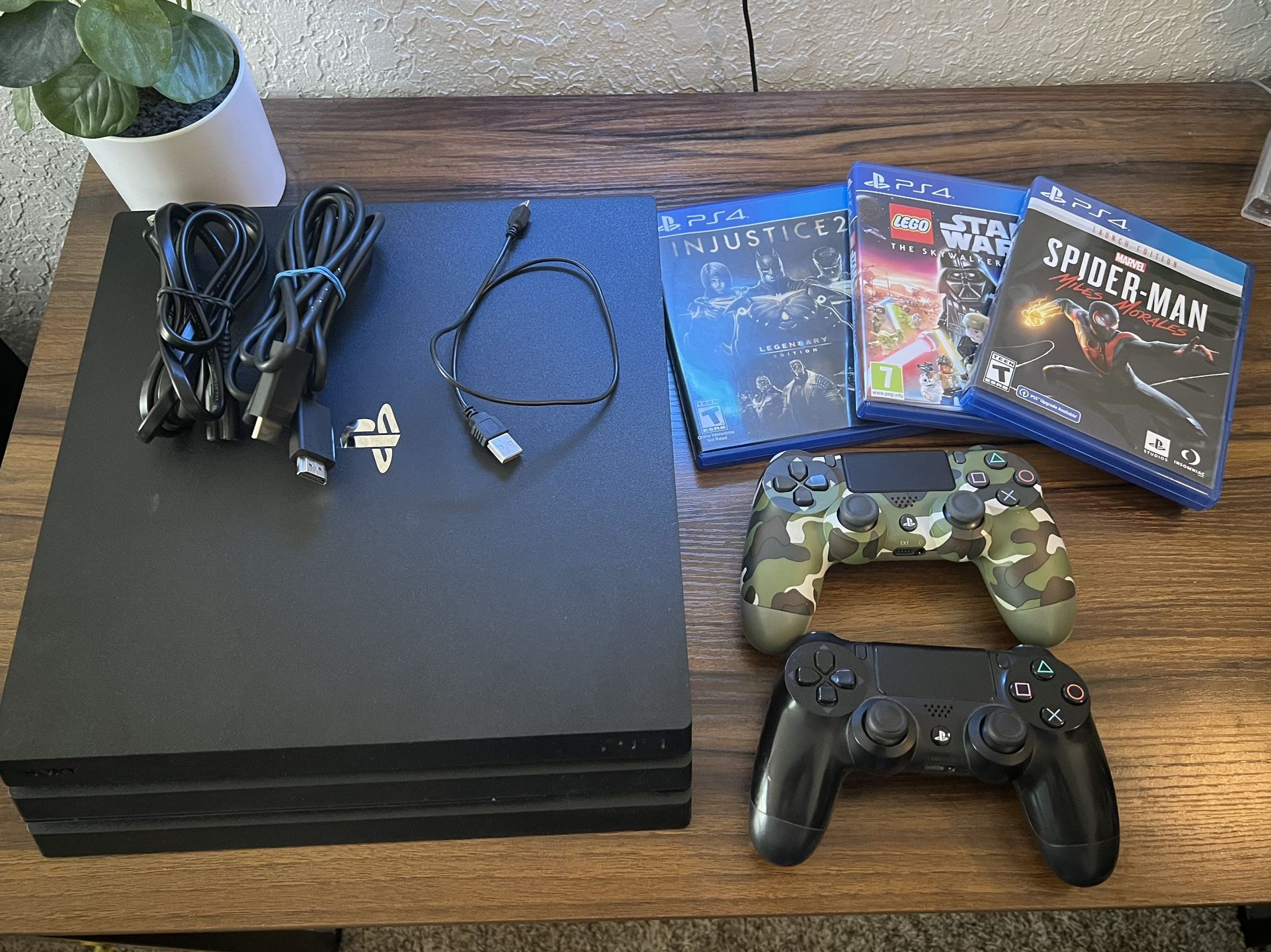PlayStation 4 Pro + 2 Controllers And 3 Games - Like New!