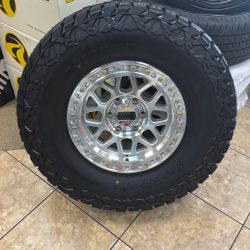 17” KMC WHEELS WITH 35” GRIPMAX TIRES 