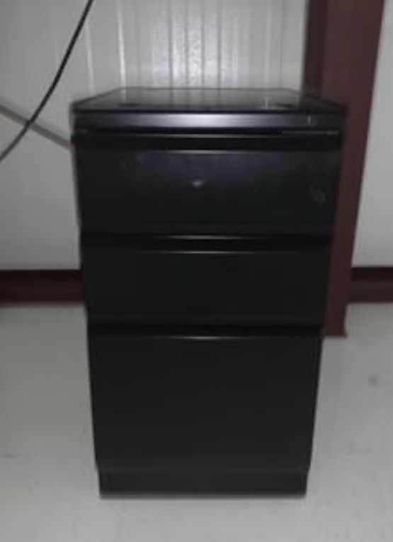 Small black filing cabinet