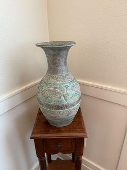 Large vase with detailed fish design