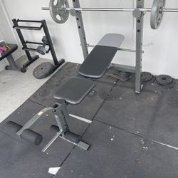bench press with bar and 2 25(comes with heavy duty rubber mats)