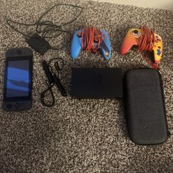 Nintendo Switch With Assorted Assesories