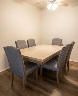 Dining table and 6 uph chairs