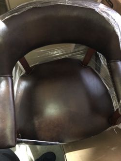 Brand new leather chair with wheels
