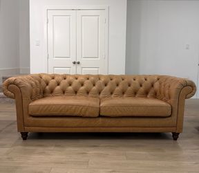 MAKE AN OFFER: Leather Chesterfield button tufted couch (gently loved)