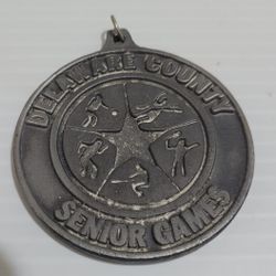 State Senior Games Delaware County Grey Medal Metal 2".

