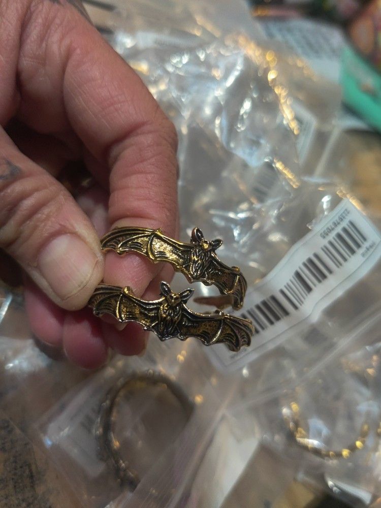 24 Pairs Of Golden/Silver Bat Earrings