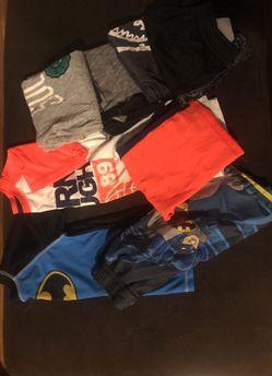 Lot 11 four short outfits boys size 6 and seven