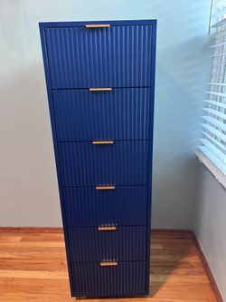 Narrow tall dresser
