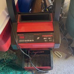 Snap on battery charger