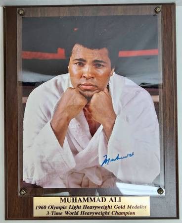 Casual Muhammad Ali Autographed Picture with COA