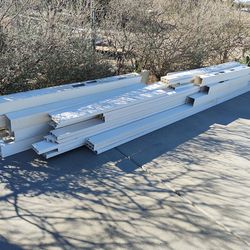 Vinyl White  tube fencing ..very light weight and easy to work with.