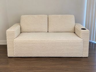 Cream Ribbed Loveseat with Cup Holder