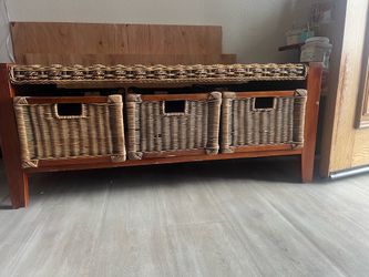 Wicker coffee table with baskets
