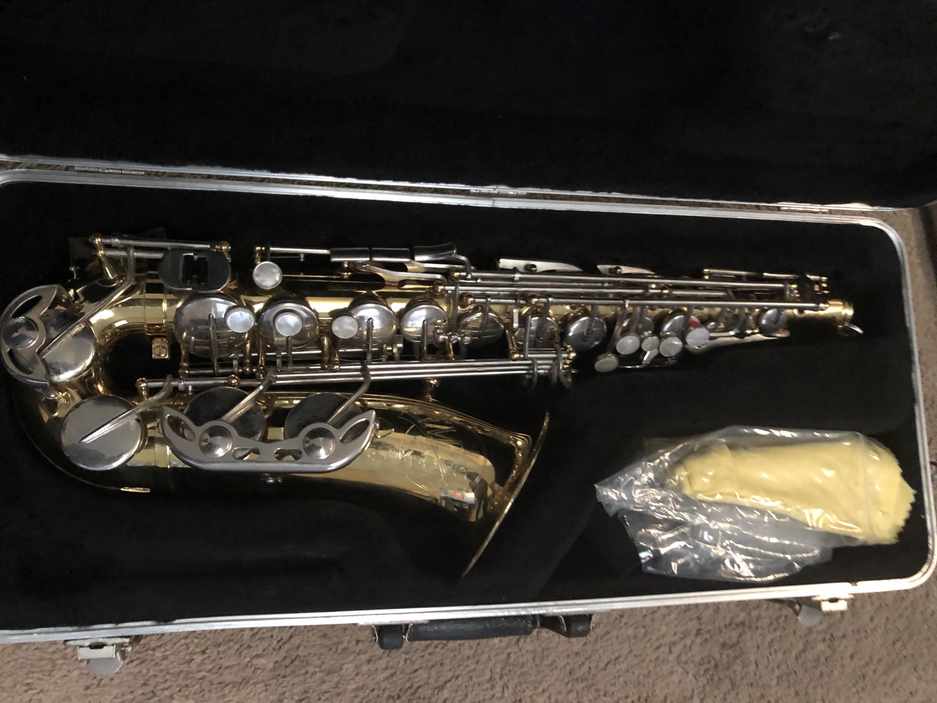 Saxophone with case
