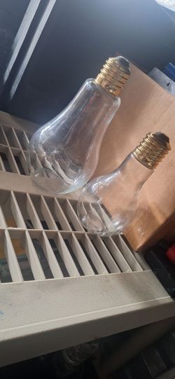 Two glass penny banks