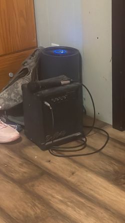 Dean Markley K-15 mini amp with a microphone