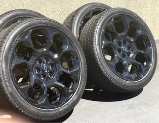 24” Chevy Silverado Tahoe Suburban OEM wheles and tires new