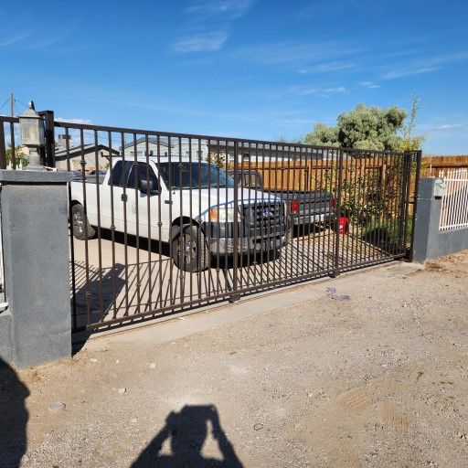 High Quality Fabricated Custom Motorized Iron Gates.