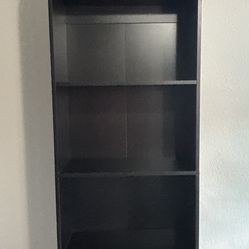 Black cabinet with shelves