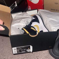Jordan 1 Mid “White Pollen Black”
