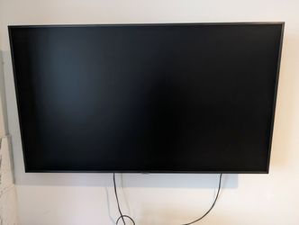 55" Samsung 4K Smart TV in great condition—Includes articulating wall mount!