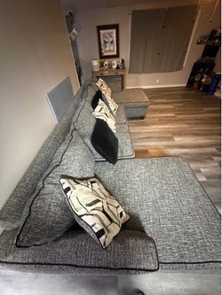 Used couch with throw pillows