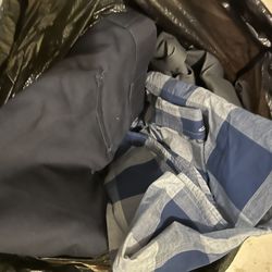 Bag Full Of Different Size Men’s Clothes