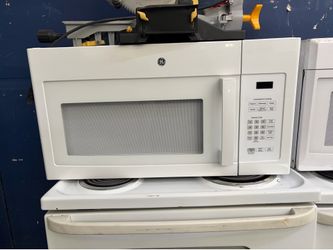 white ge over the range microwave like new condition