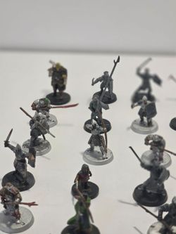 The Lord of the Rings strategy game figurines. Mixture of Minas Tirith warriors and Uruk Hai warriors.