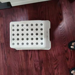 IKEA BOLMEN white step stool featuring 24 circular anti-slip holes on top.