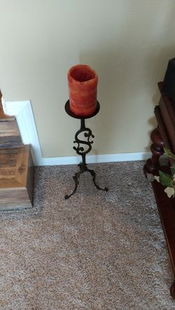 Candle holder with candle