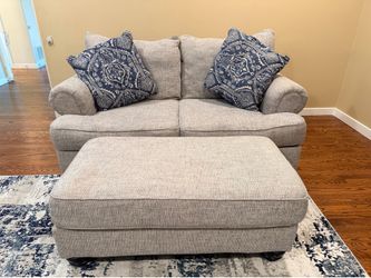 Ashley Furniture Grey Loveseat and Matching Oversized Ottoman