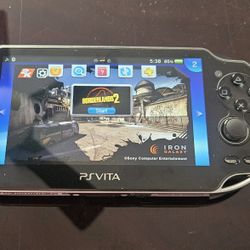 PS Vita With Games 125GB charger & Case Meet By 89122 Area