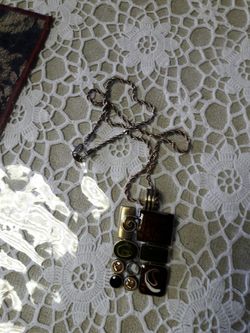 brass and stones pendent