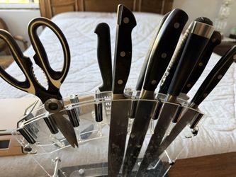 Assorted Knifes And Stand $10
