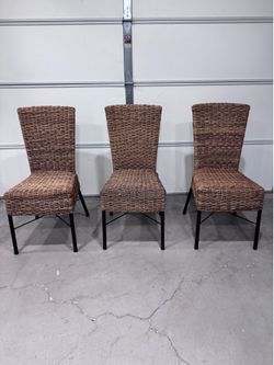 Woven Rattan chairs. Set of 3.