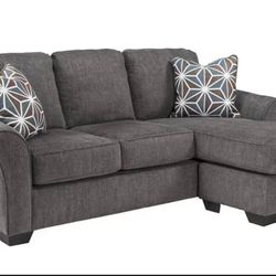 Ashley furniture sleeper sofa with chaise. Grey in color