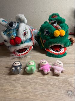 Two Chinese lion puppets and 4 mini favors $20